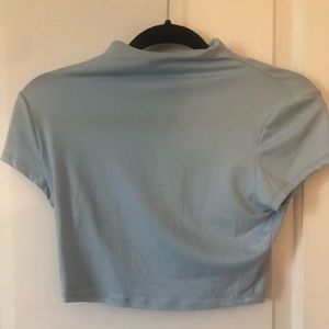Baby blue cropped mock neck top